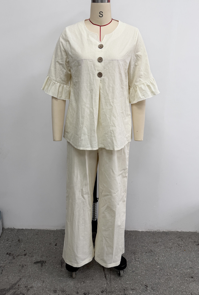 Women's two-piece set – ruffle V-neck top detail and three-quarter sleeve close-up