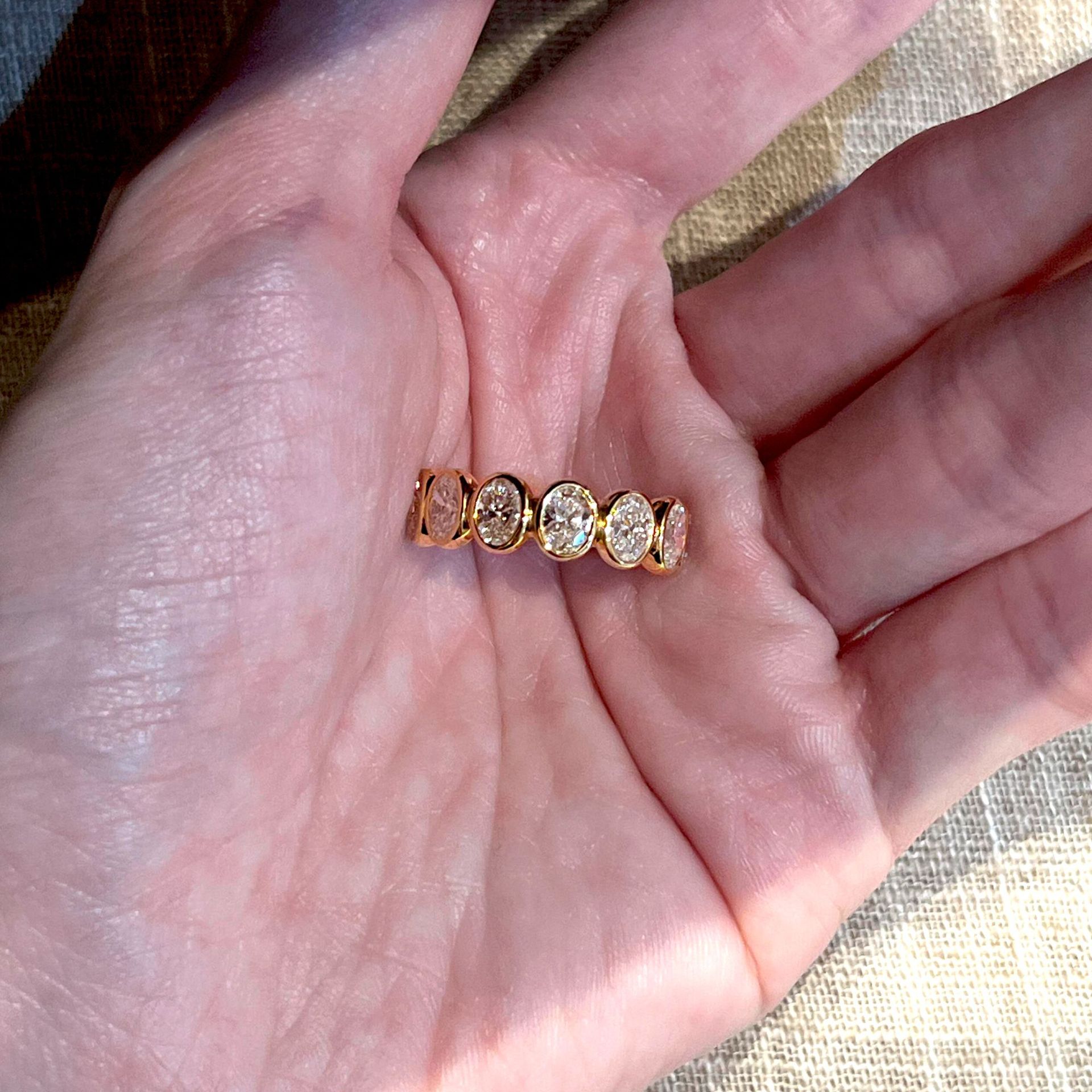 Women Gold Tone Bezel Set Oval Paved