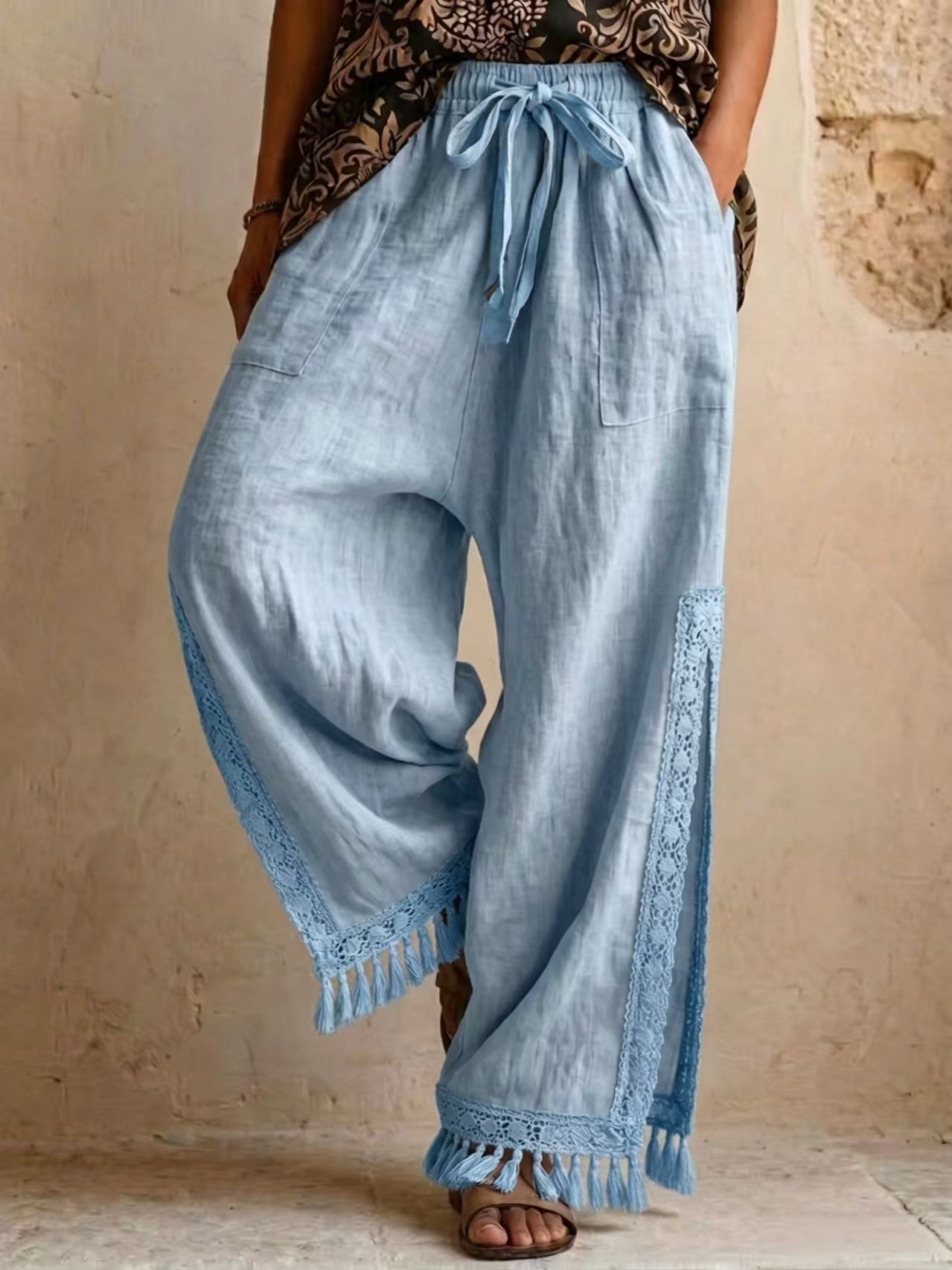 Women's wide-leg pants – sky blue colorway beach resort lifestyle shot