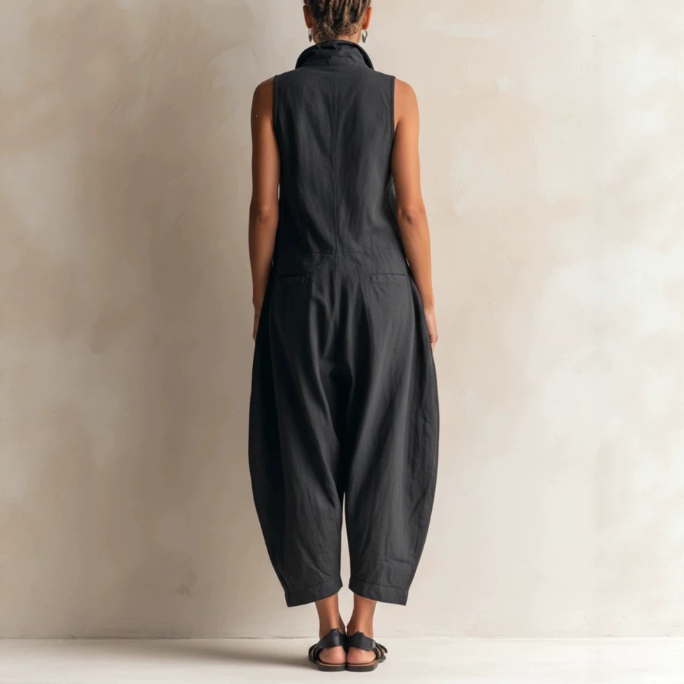 Women's wide-leg cargo jumpsuit detail view showing pocket construction and cotton fabric texture